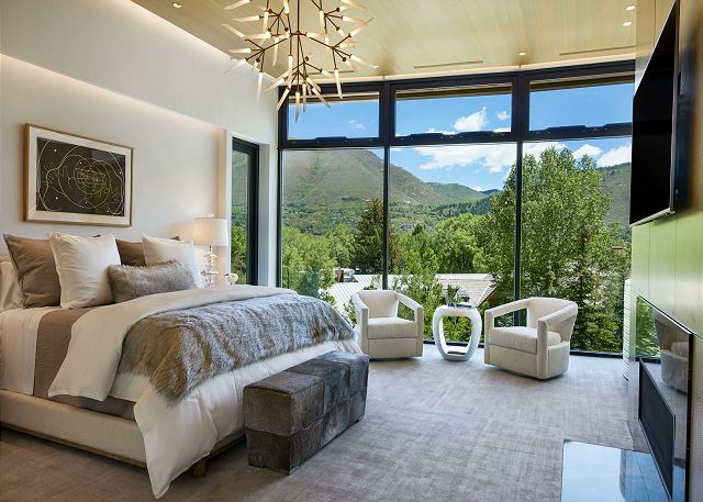 Luxurious, cozy bedroom with gorgeous views