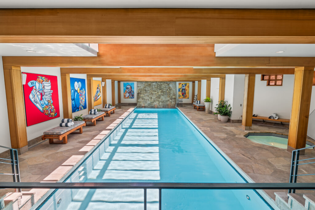 View of interior pool, with hottub and lounge area