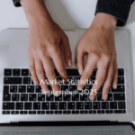 Person Typing Real Estate Market Reportsw